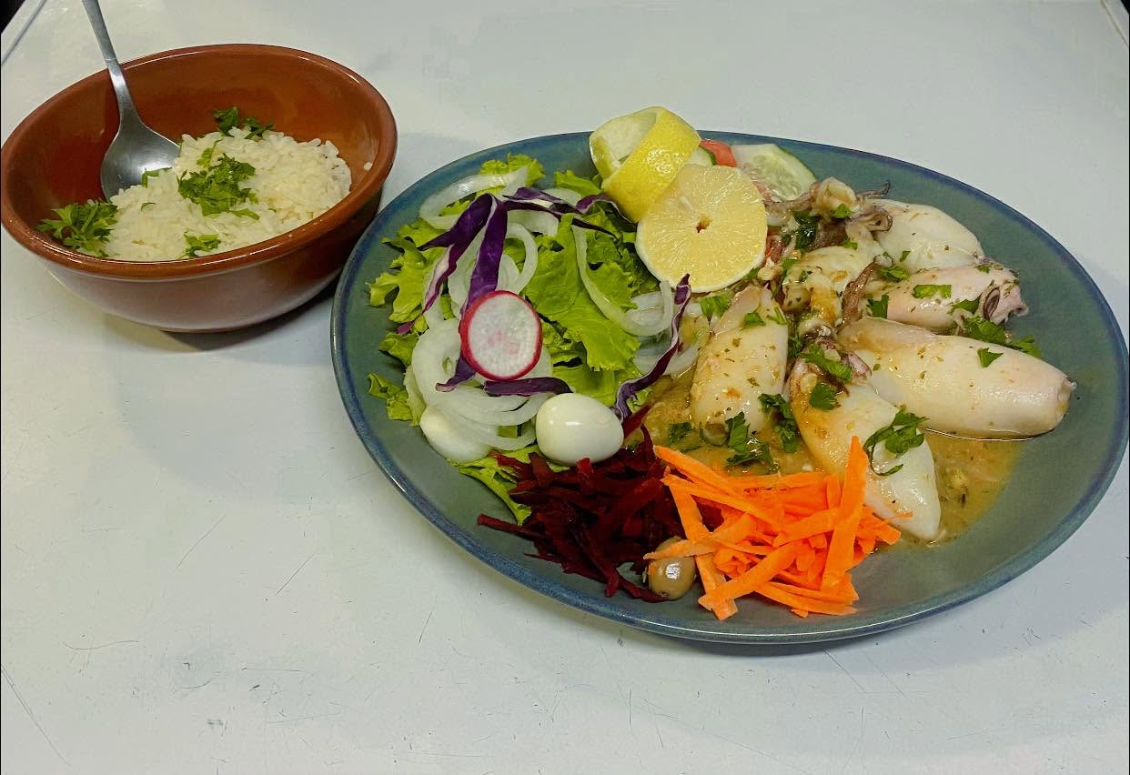 Grilled squid with rice and salad