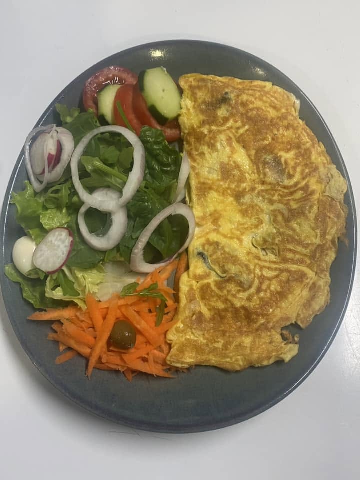 Fluffy omelette with a fresh garden salad